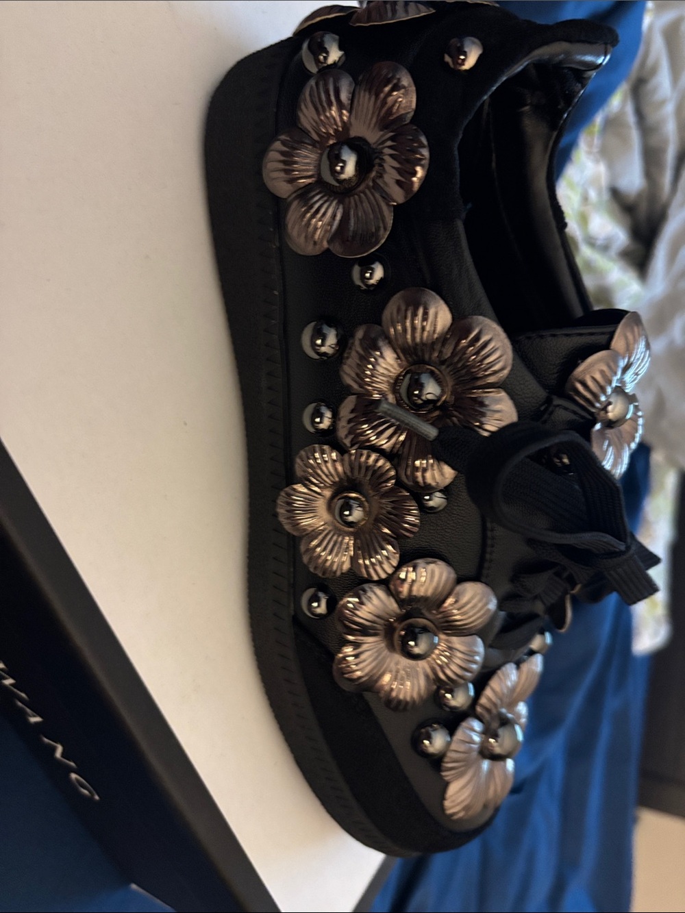 Black Lace-Up Sneakers with Metallic Floral Embellishments